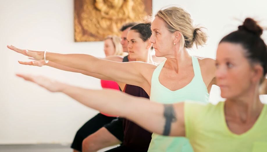 Students undertaking yoga teacher training in Brisbane