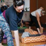 Students learning to become yoga teachers